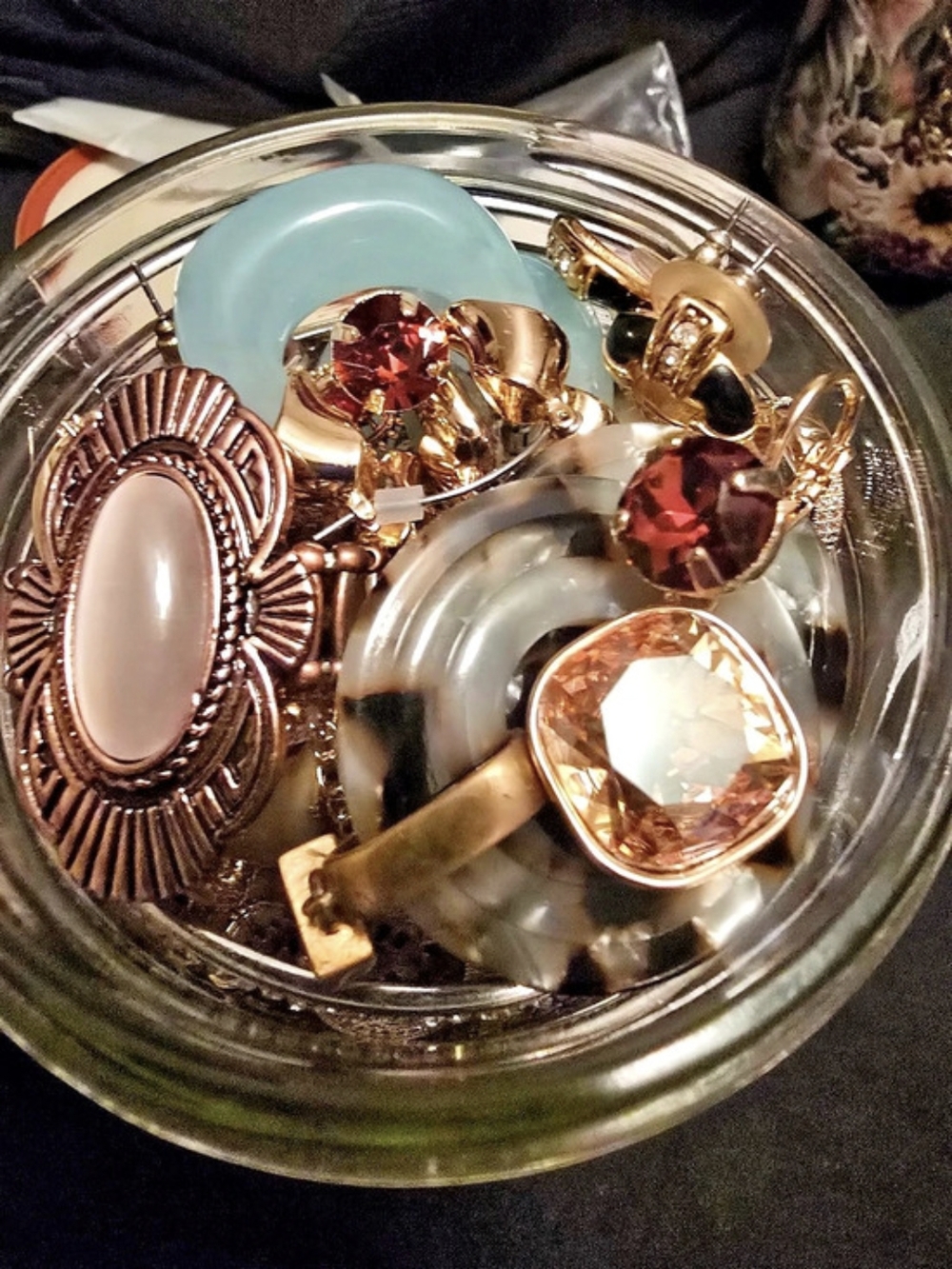 Assorted Gold-Tone Jewelry in Glass Container
